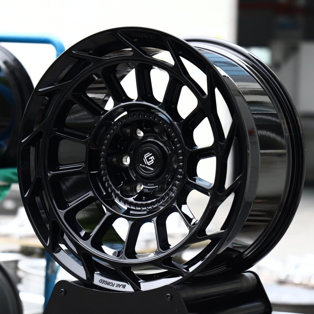 Toyota Tacoma wheels – Gloss Black Directional Mesh (Glak Forged-Style), angled view