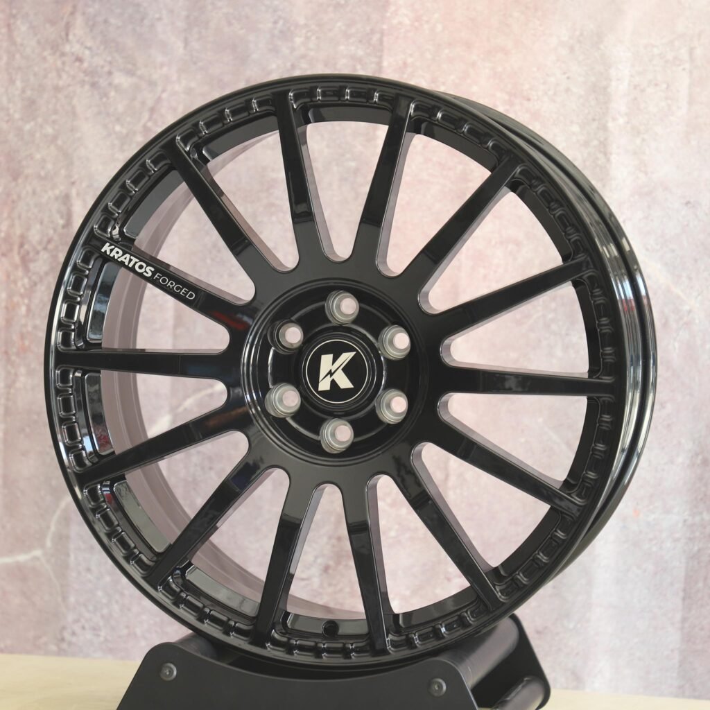 Toyota Tacoma wheels – Gloss Black 14-Spoke, angled view