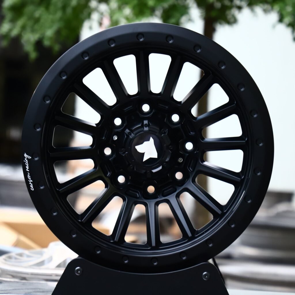 Ram 2500 wheels – Gloss Black 16-Spoke Exposed Bolt Detail, front view
