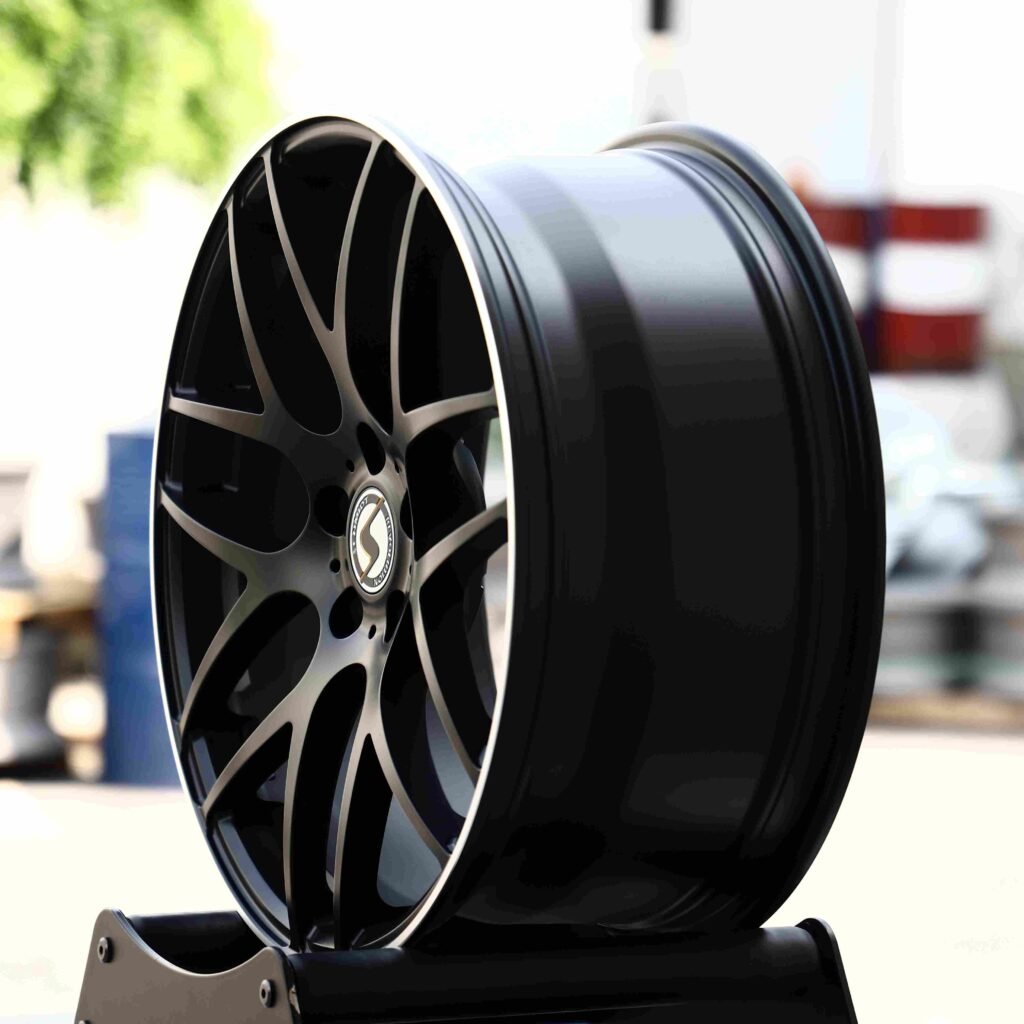 5x100 wheels – Gloss Black 7 Y-Spoke Machined Lip, side view