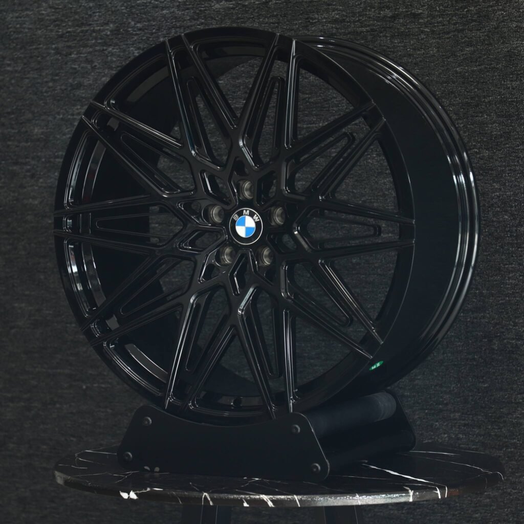 5x120 wheels – Gloss Black Cross-Spoke, side view
