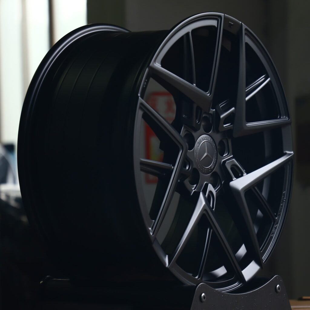5x112 wheels – Gloss Black Cross-Spoke, side view