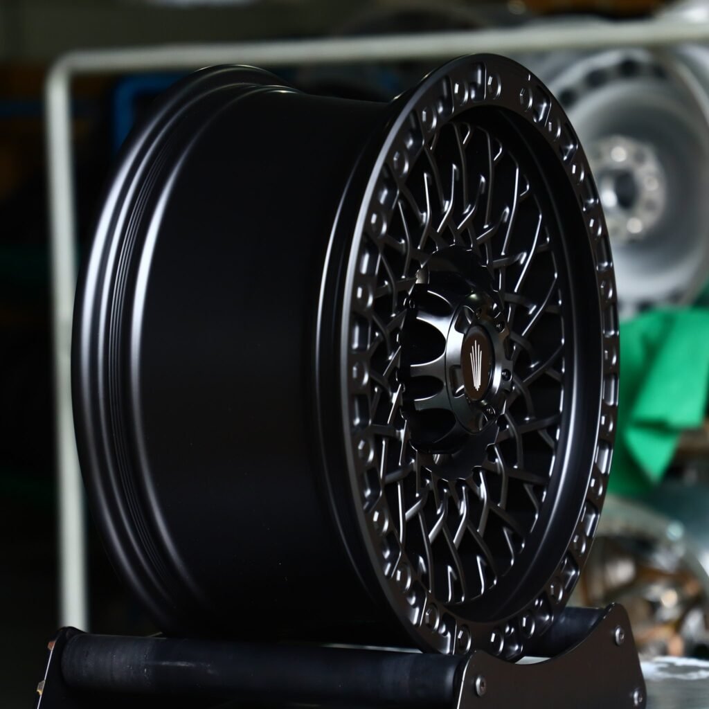 Toyota Tacoma wheels – Gloss Black Cut-Out Exposed Bolt Detail, angled view