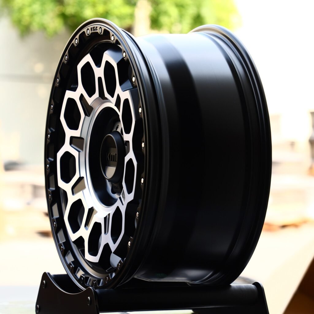 6x139.7 wheels – Gloss Black Deep Lip Exposed Bolt Detail (KMC-Style), side view