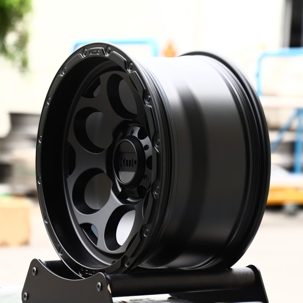 6x139.7 wheels – Gloss Black Deep Lip Exposed Bolt Detail (KMC-Style), side view