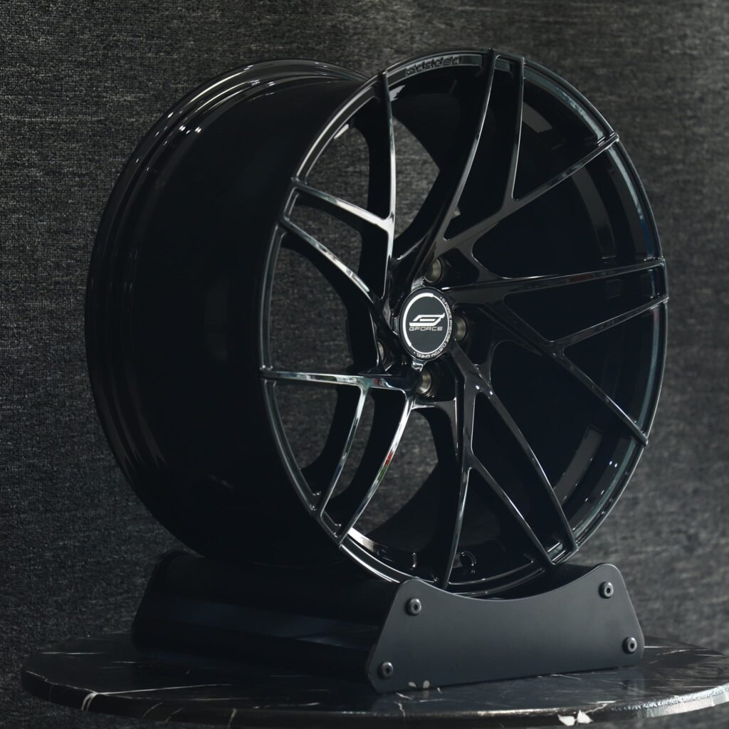 Tesla Model Y wheels – Gloss Black Directional Milled, angled view