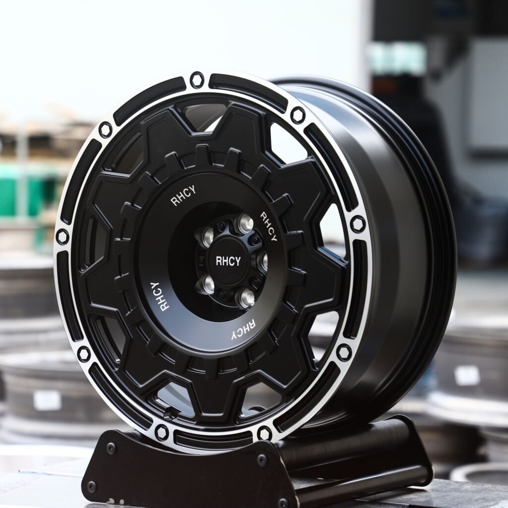 Toyota Tacoma wheels – Gloss Black Exposed Bolt Detail Full-Face Machined Face, angled view