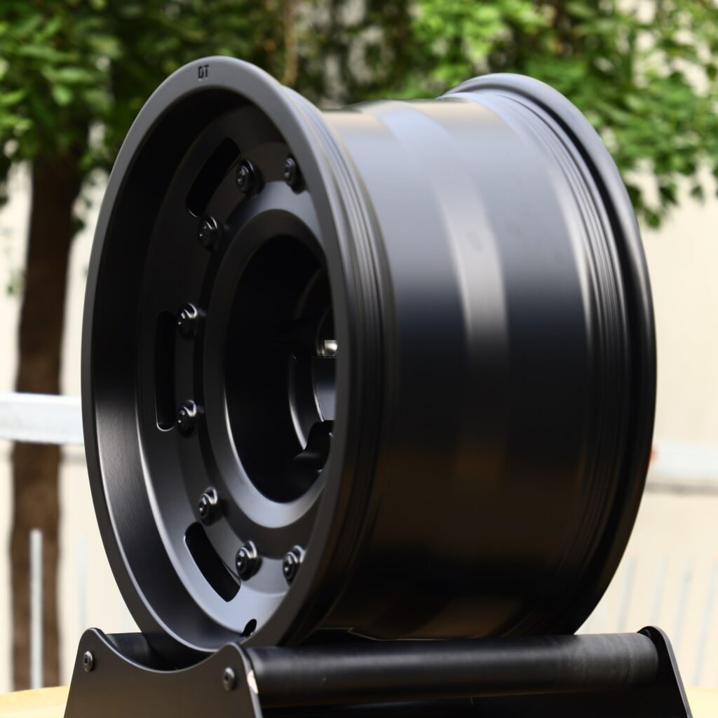 Toyota Land Cruiser wheels – Gloss Black Full-Face Exposed Bolt Detail, angled view