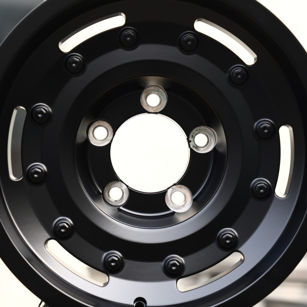 5x127 wheels – Gloss Black Full-Face Exposed Bolt Detail, side view