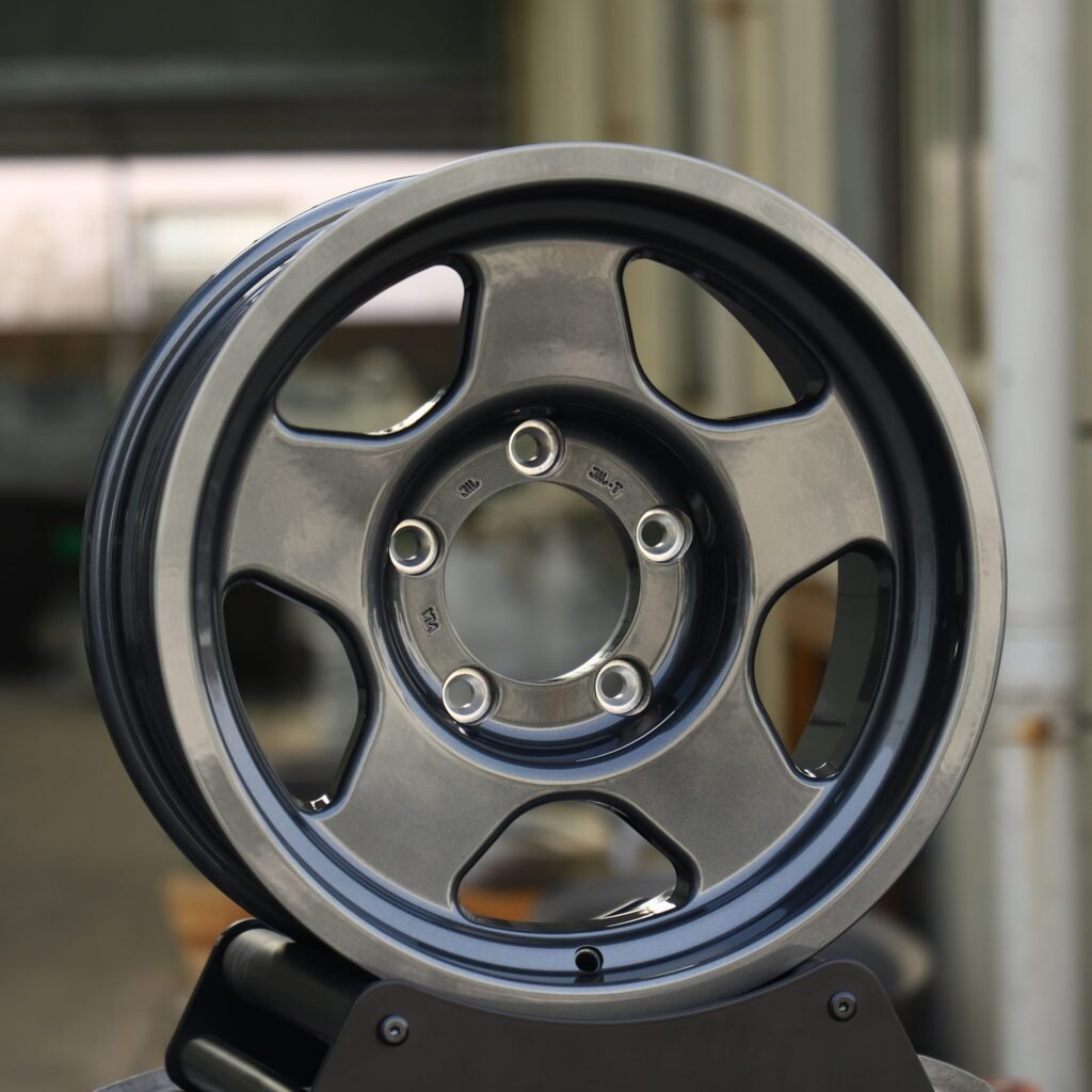 Toyota Tacoma wheels – Gloss Black / Gunmetal 5-Spoke Deep Lip, angled view