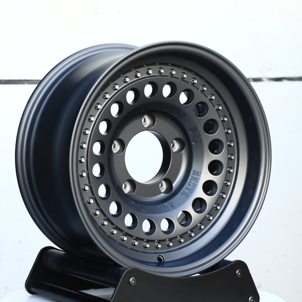 Toyota Tacoma wheels – Gloss Black / Gunmetal / Gray Full-Face Deep Lip, angled view