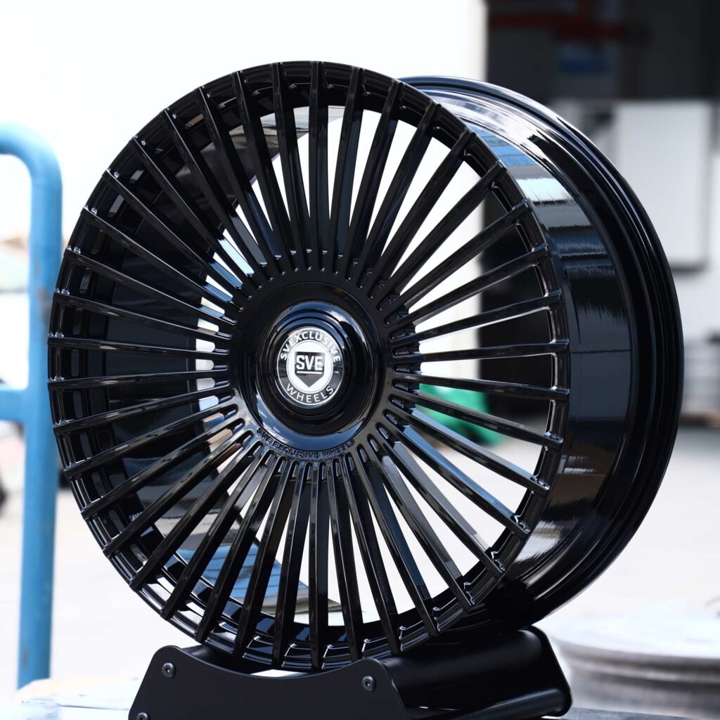 Ford Mustang wheels – Gloss Black Multi-Spoke (SVE-Style), angled view