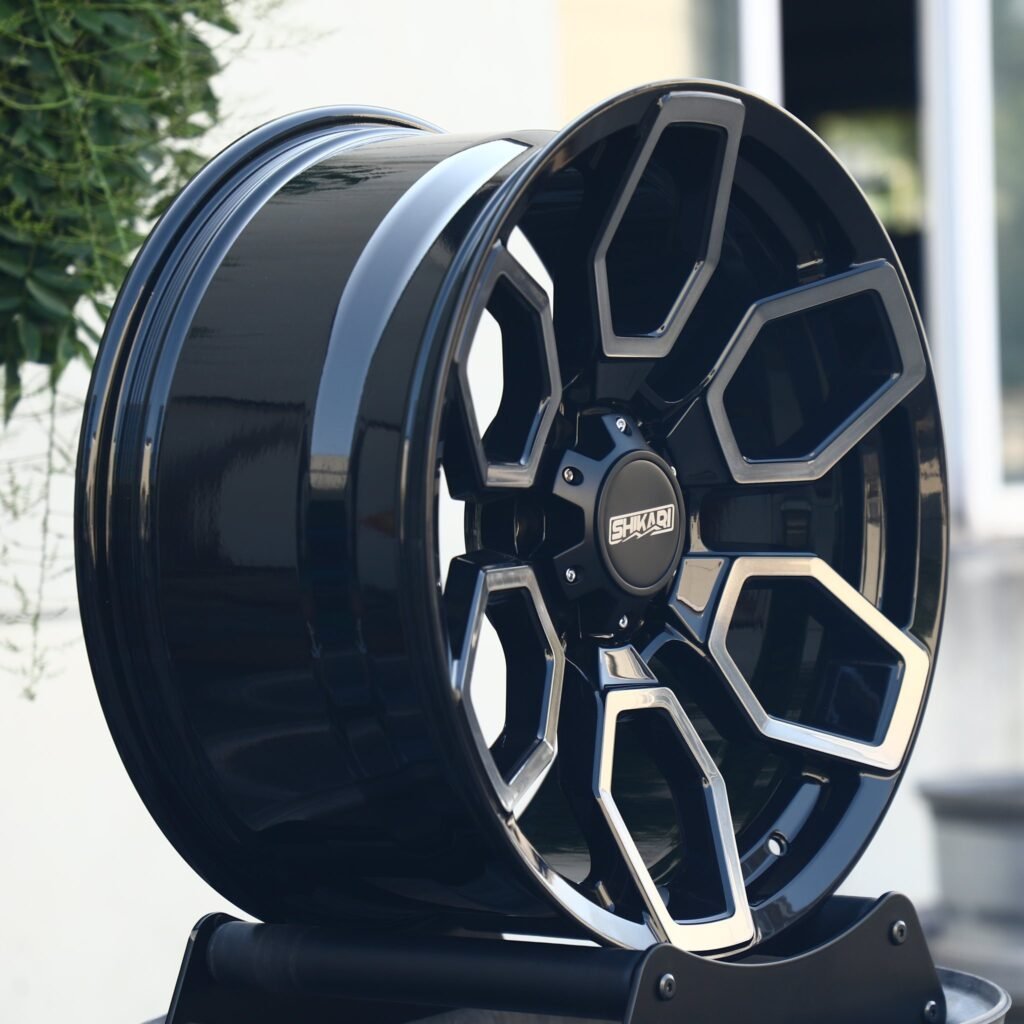6x139.7 wheels – Gloss Black Petal Machined Face, side view