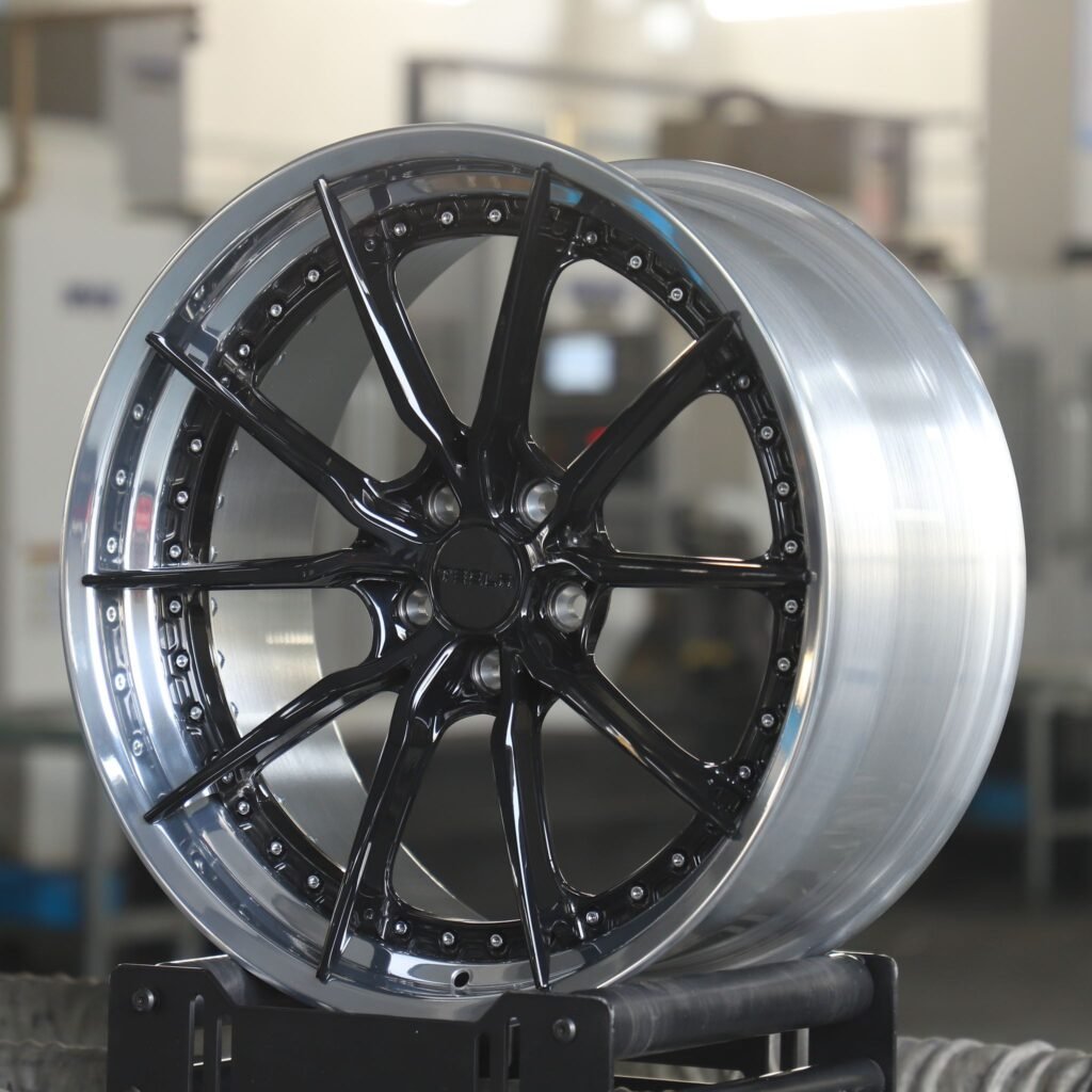 BMW 5 Series wheels – Gloss Black / Silver Faux 2-Piece 10-Spoke (Vossen-Style), angled view