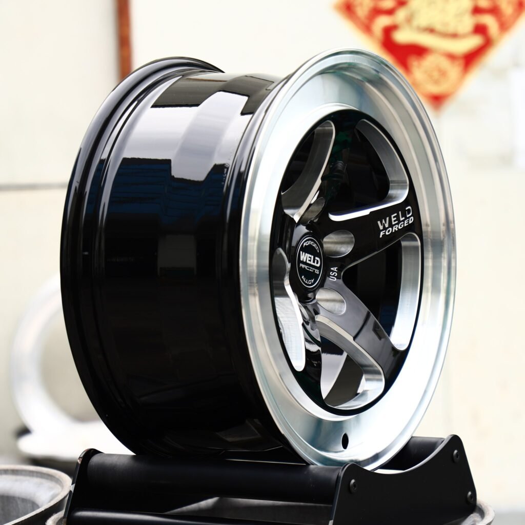 5x112 wheels – Gloss Black / Silver Wide Lip (Weld Racing-Style), side view