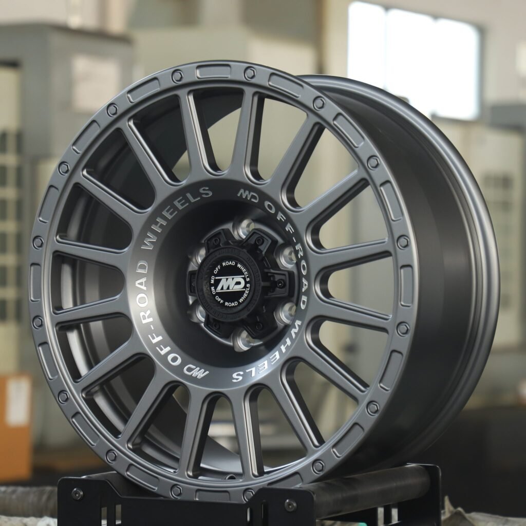Toyota Tacoma wheels – Gray 16-Spoke Exposed Bolt Detail, angled view