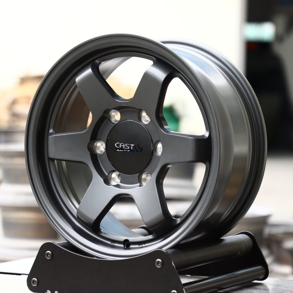 Toyota Tacoma wheels – Gray / Gloss Black / Gunmetal Custom, angled view