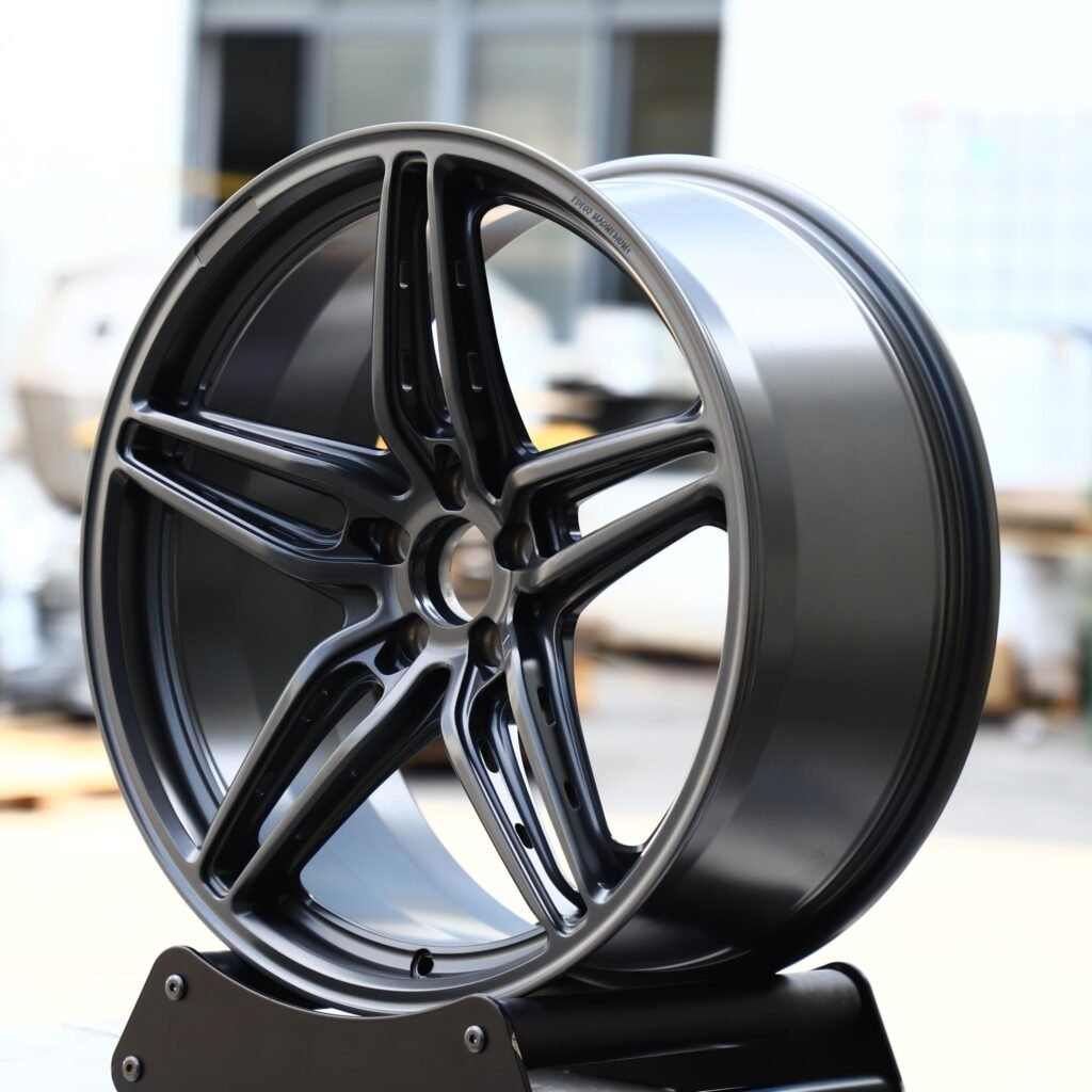 BMW M3 G80 wheels – Gloss Black / Gunmetal Custom (HRE P107SC-Style), angled view