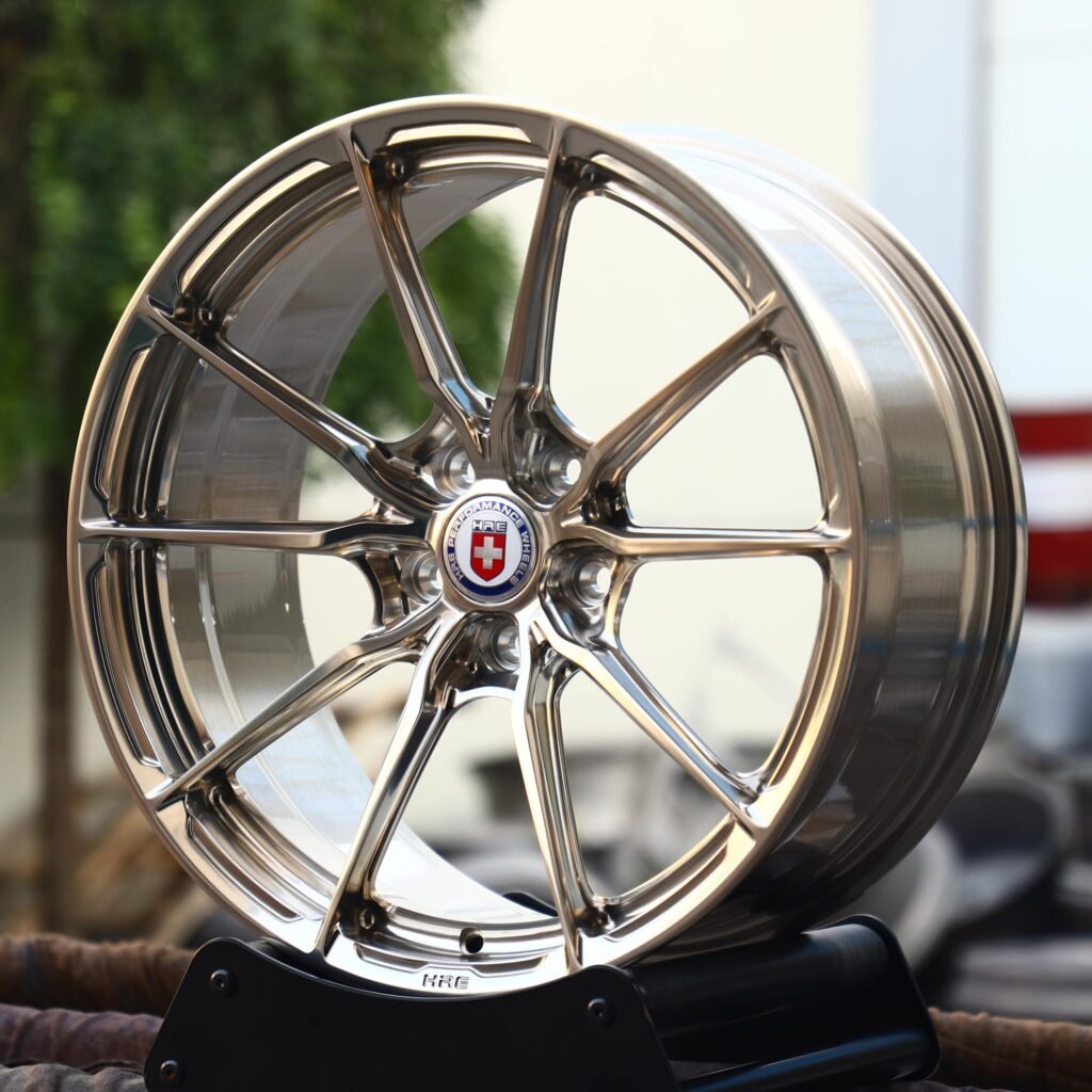 Porsche 718 Cayman wheels – Custom Finish 10-Spoke Mirror Polished (HRE Performance P104SC-Style), angled view