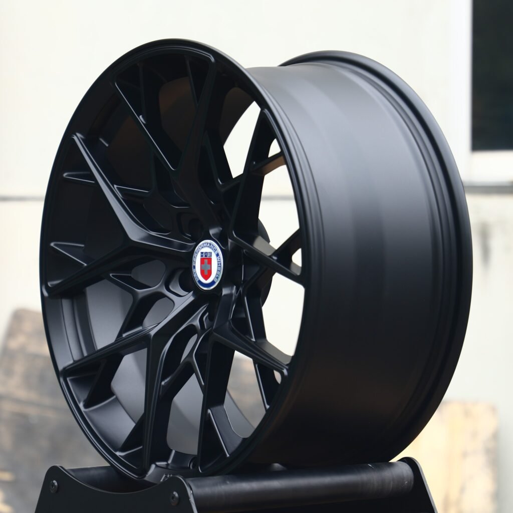 5x114.3 wheels – Gloss Black Cross-Spoke (HRE Performance P200-Style), side view