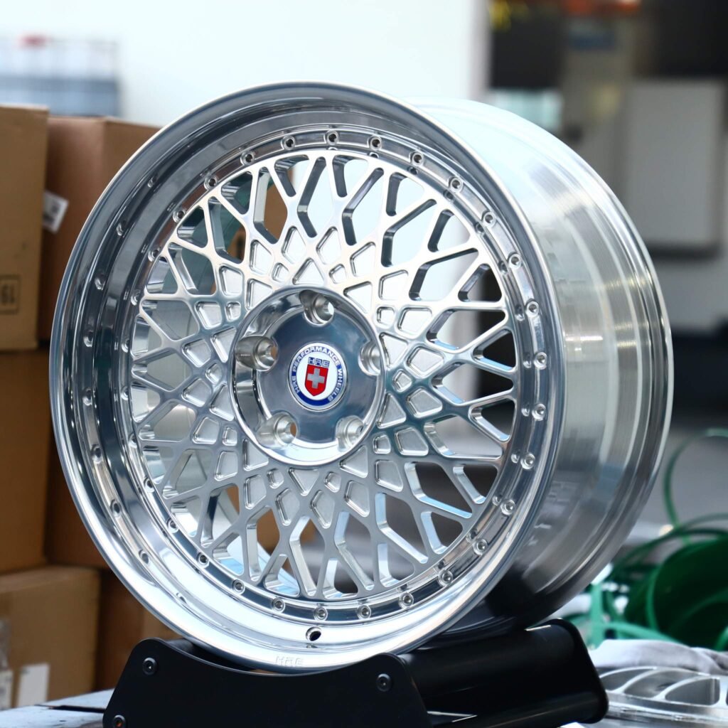BMW M3 G80 wheels – Matte Silver Deep Lip Cut-Out Riveted (HRE Performance 501-Style), angled view