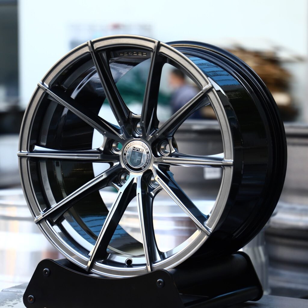 Porsche 718 Cayman wheels – Metallic Gray 10-Spoke (HRE Performance P104SC-Style), angled view