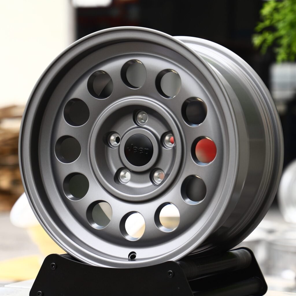 Jeep Grand Cherokee wheels – Matte Gunmetal Steelie Dish (Jeep OEM-Style), angled view