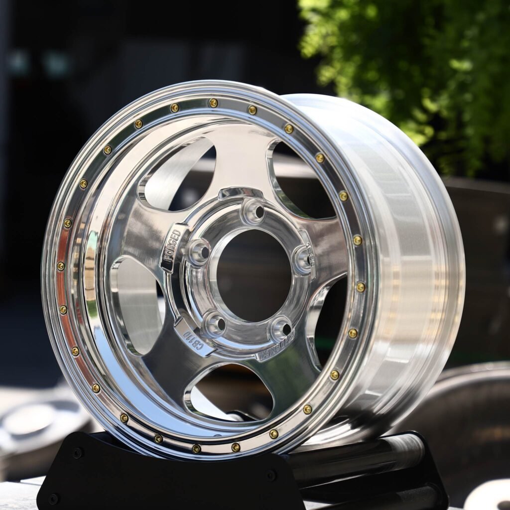 Land Rover Defender wheels – Mirror Polished 5-Spoke Riveted Lip, angled view