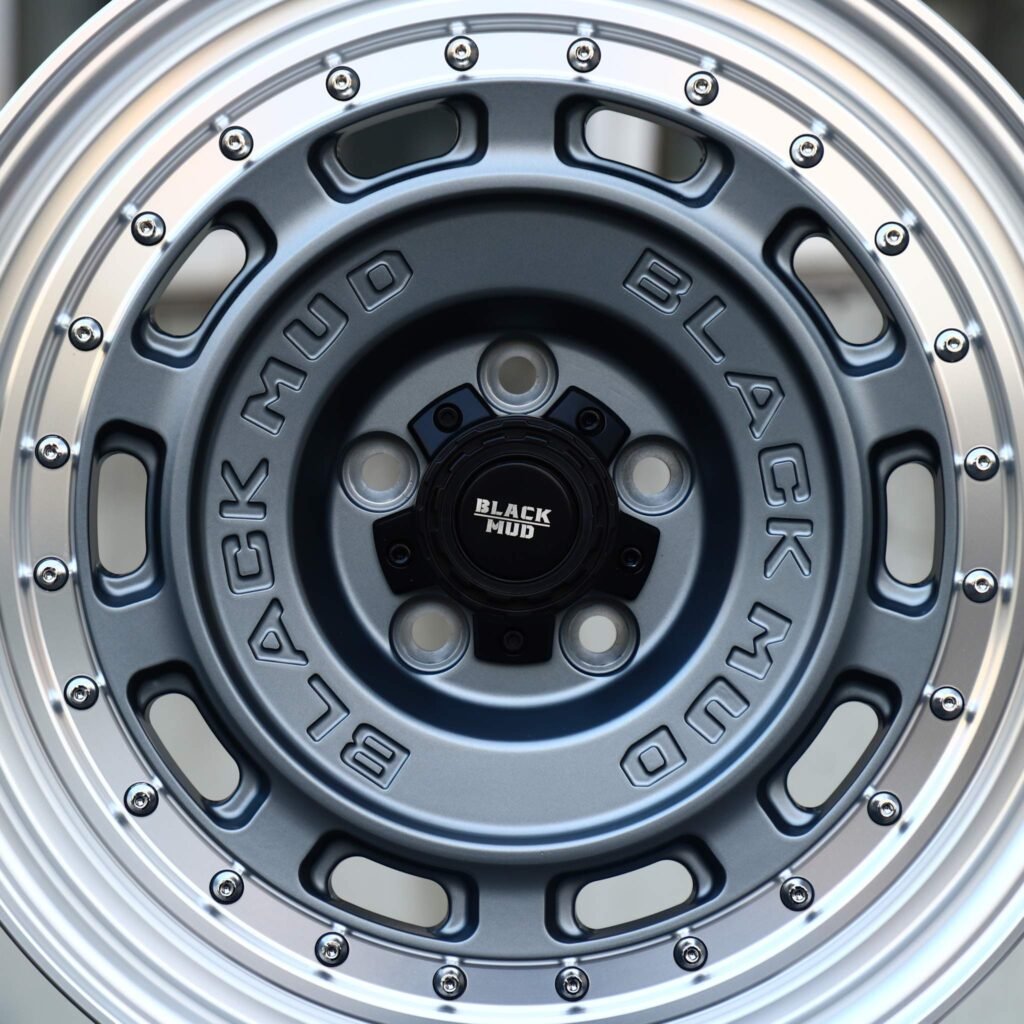 Jeep Grand Cherokee wheels – Gunmetal / Polished Riveted Slotted Deep Lip, angled view
