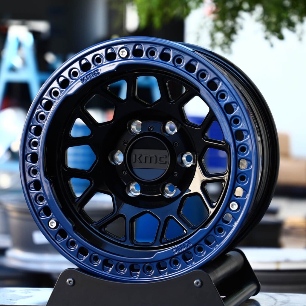 Toyota 4Runner wheels – KMC Blue / Gloss Black Beadlock, front view