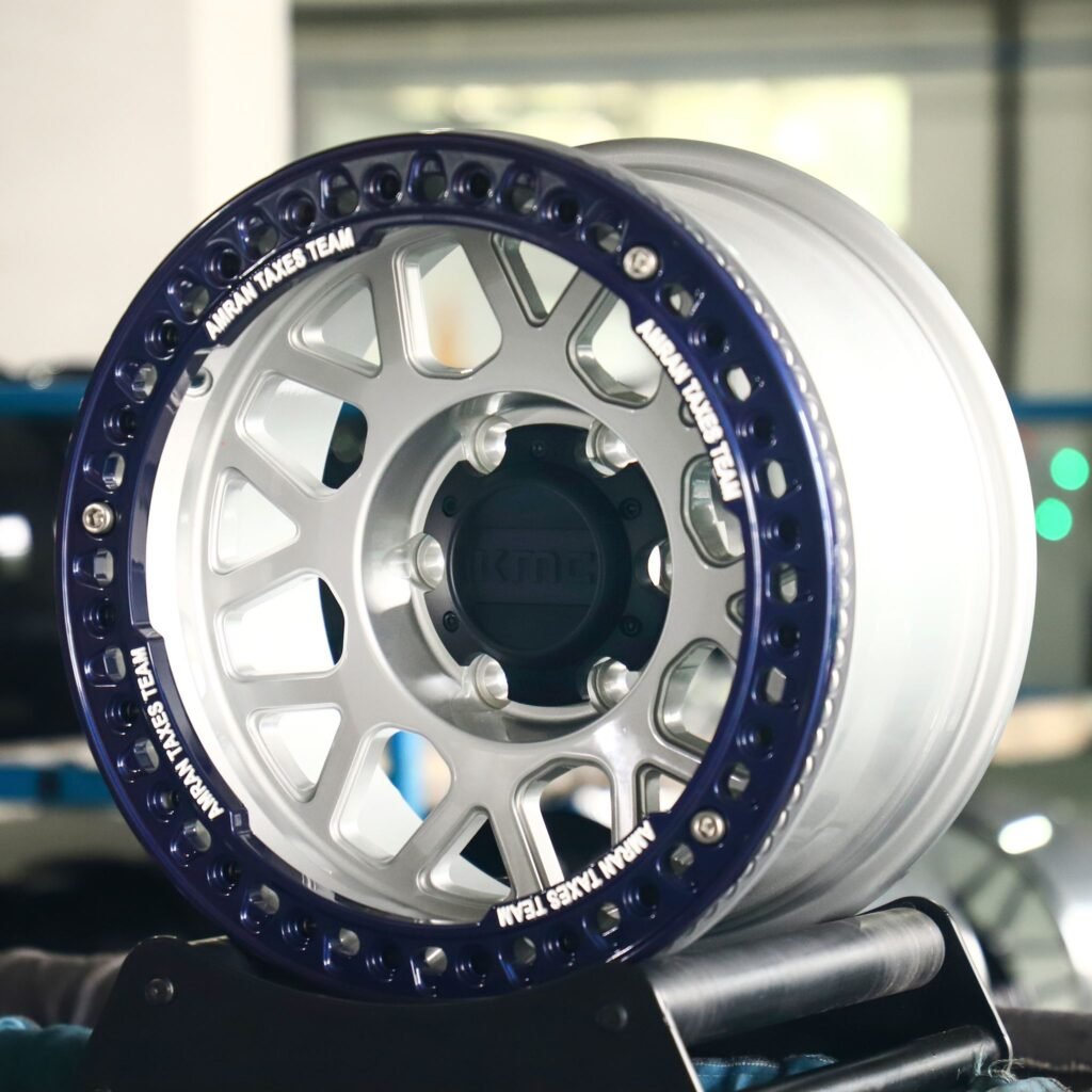 6x139.7 wheels – KMC Blue / Silver Beadlock, side view