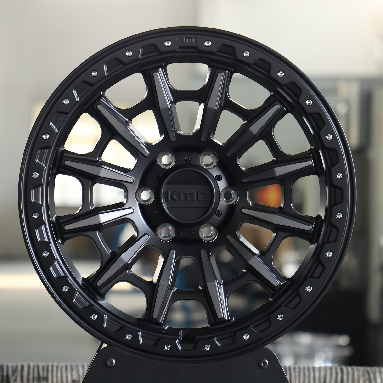 Toyota 4Runner wheels – KMC Custom Finish Riveted Double Ring Lip, front view