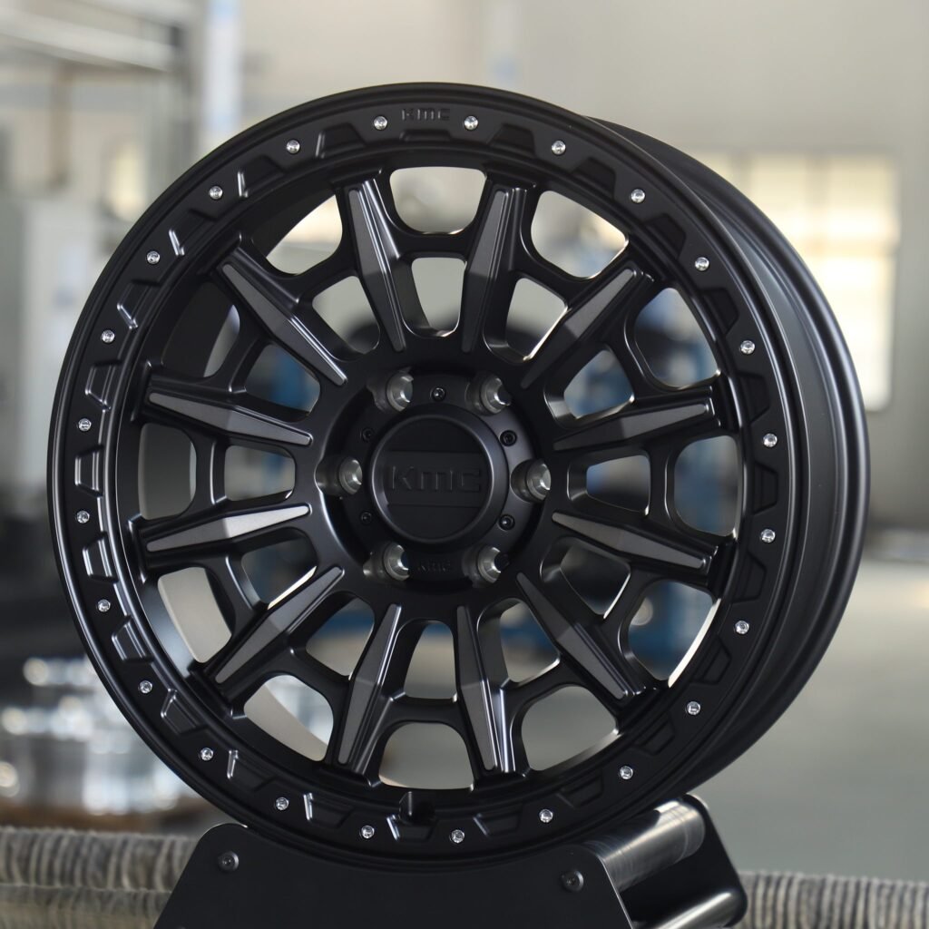 Toyota Tacoma wheels – KMC Custom Finish Riveted Double Ring Lip, angled view