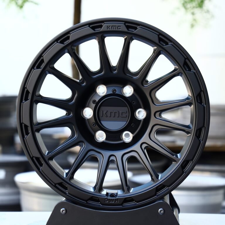 Toyota 4Runner wheels – KMC Gloss Black 16-Spoke, front view