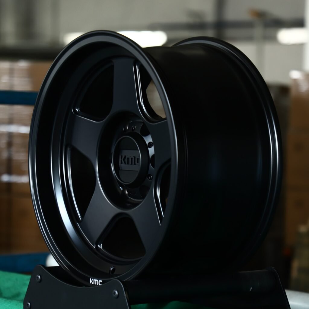 6x139.7 wheels – KMC Gloss Black Deep Lip, side view