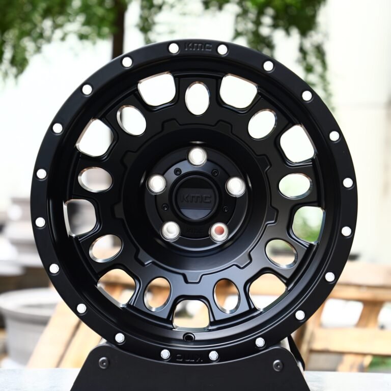 Toyota 4Runner wheels – KMC Gloss Black Exposed Bolt Detail Deep Lip Full-Face, front view