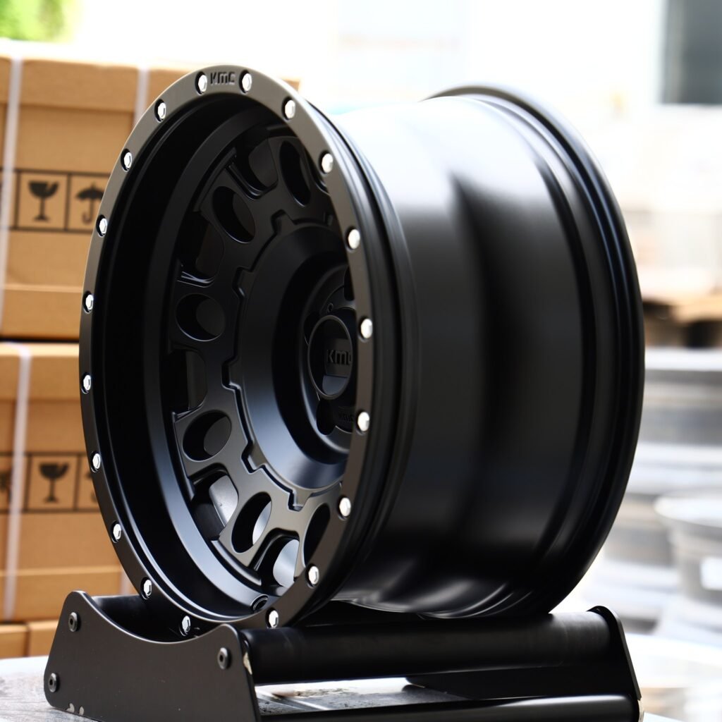 6x139.7 wheels – KMC Gloss Black Exposed Bolt Detail Deep Lip Full-Face, side view