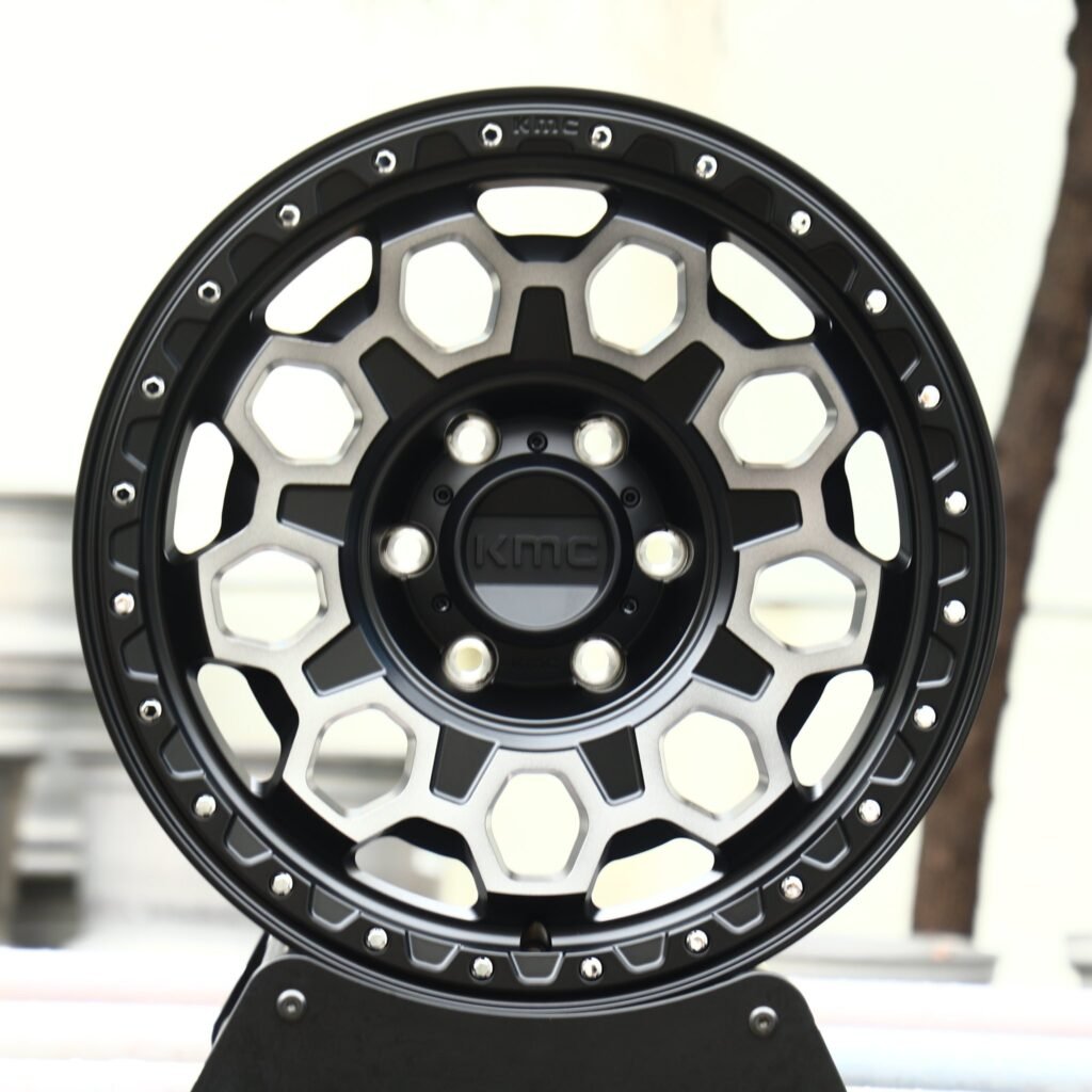 Toyota 4Runner wheels – KMC Gloss Black Exposed Bolt Detail Deep Lip, front view