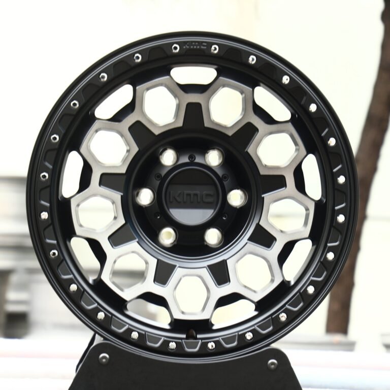 Toyota 4Runner wheels – KMC Gloss Black Exposed Bolt Detail Deep Lip, front view