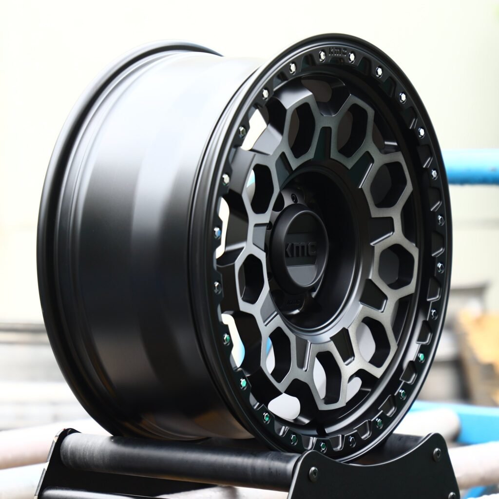 6x139.7 wheels – KMC Gloss Black Exposed Bolt Detail Deep Lip, side view
