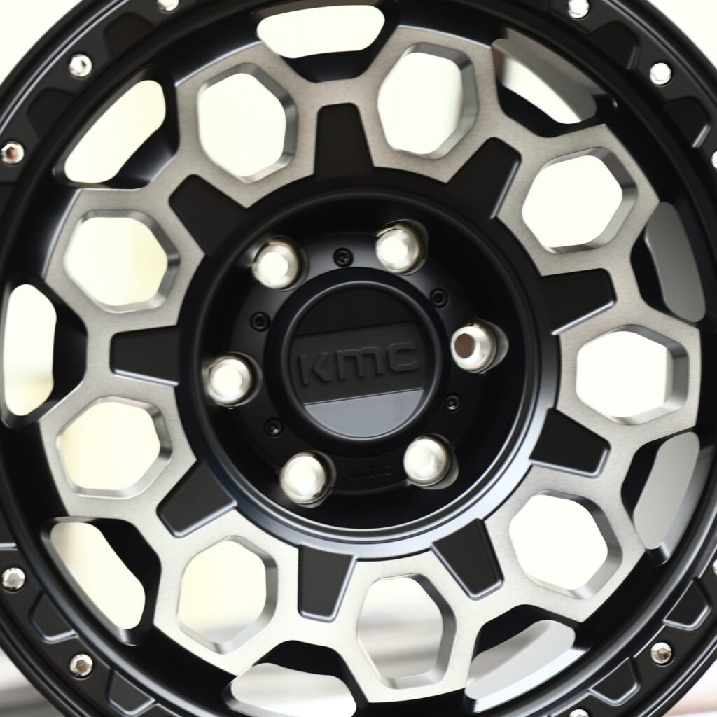Chevrolet Silverado 1500 wheels – KMC Gloss Black Exposed Bolt Detail Deep Lip, lip and barrel detail