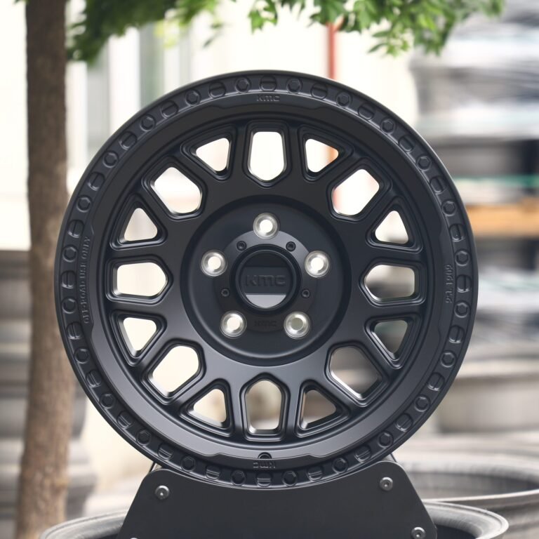 Toyota 4Runner wheels – KMC Gloss Black Exposed Bolt Detail, front view