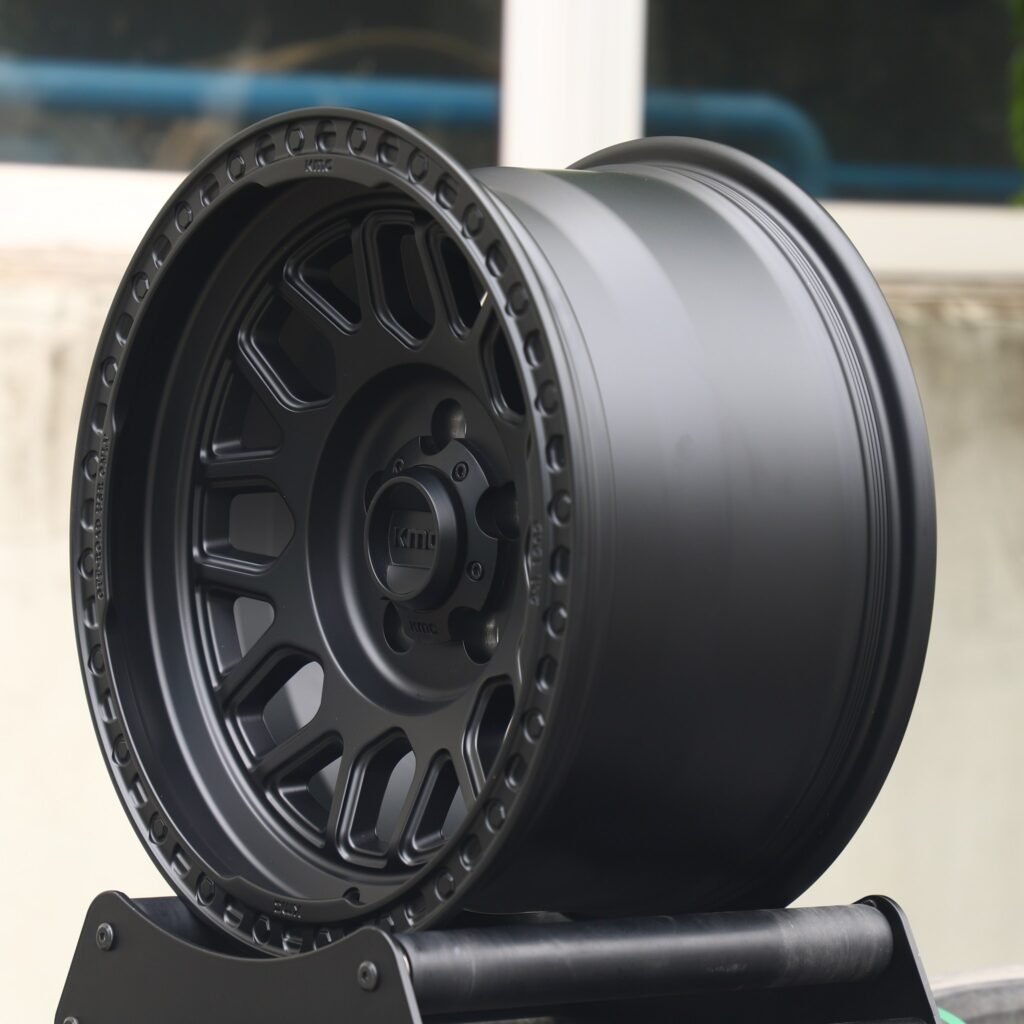 6x139.7 wheels – KMC Gloss Black Exposed Bolt Detail, side view