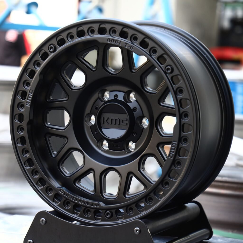 Chevrolet Silverado 2500HD wheels – KMC Gloss Black Beadlock, angled view