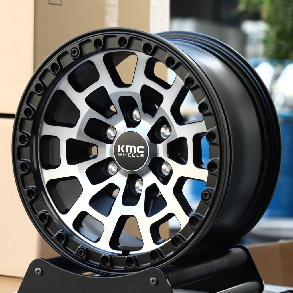 Toyota Tacoma wheels – KMC Gloss Black Machined Face Beadlock, angled view