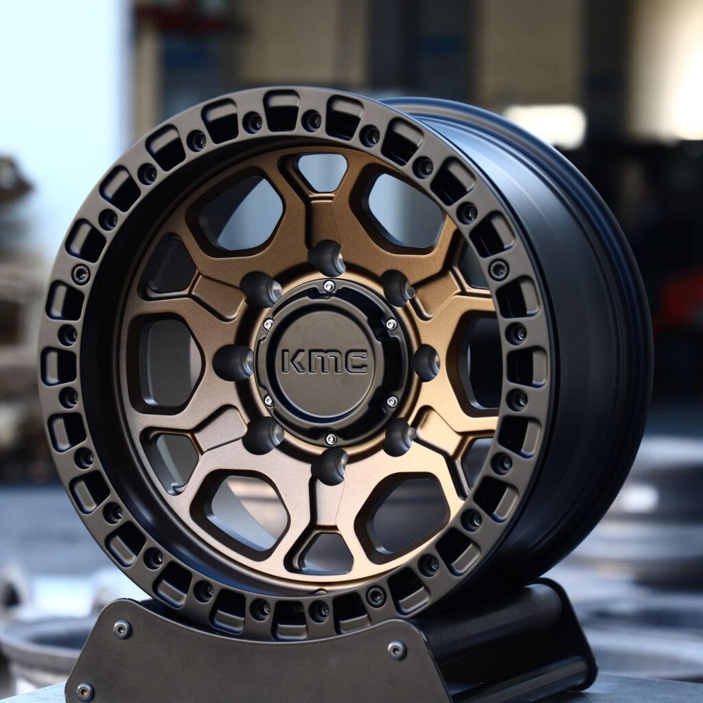 Chevrolet Silverado 2500HD wheels – Bronze / Gloss Black 8-Spoke Beadlock (KMC-Style), angled view