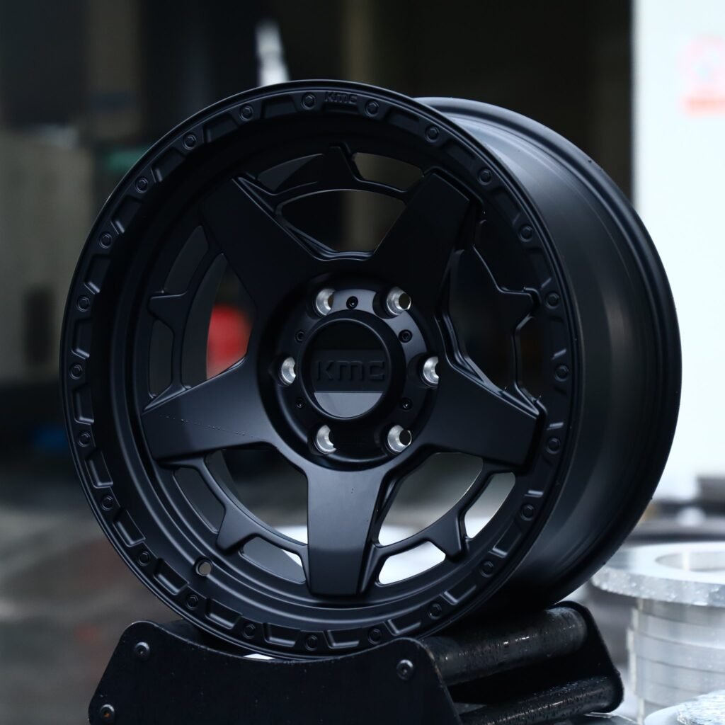 Chevrolet Silverado wheels – Matte Black Split-Spoke Bolt-Ring (KMC-Style), angled view