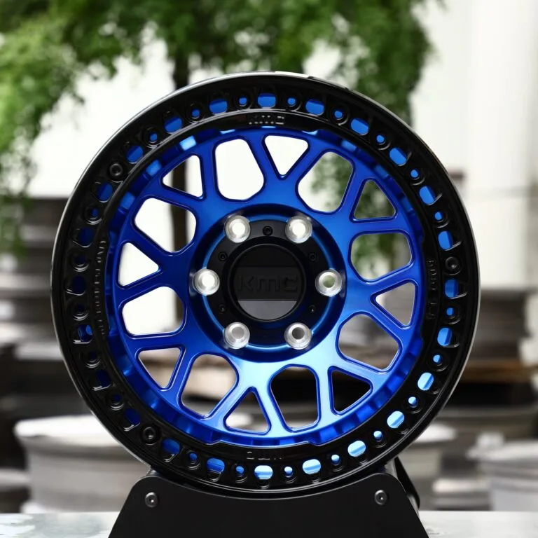 Toyota 4Runner wheels – KMC Transparent / Blue / Gloss Black Beadlock, front view