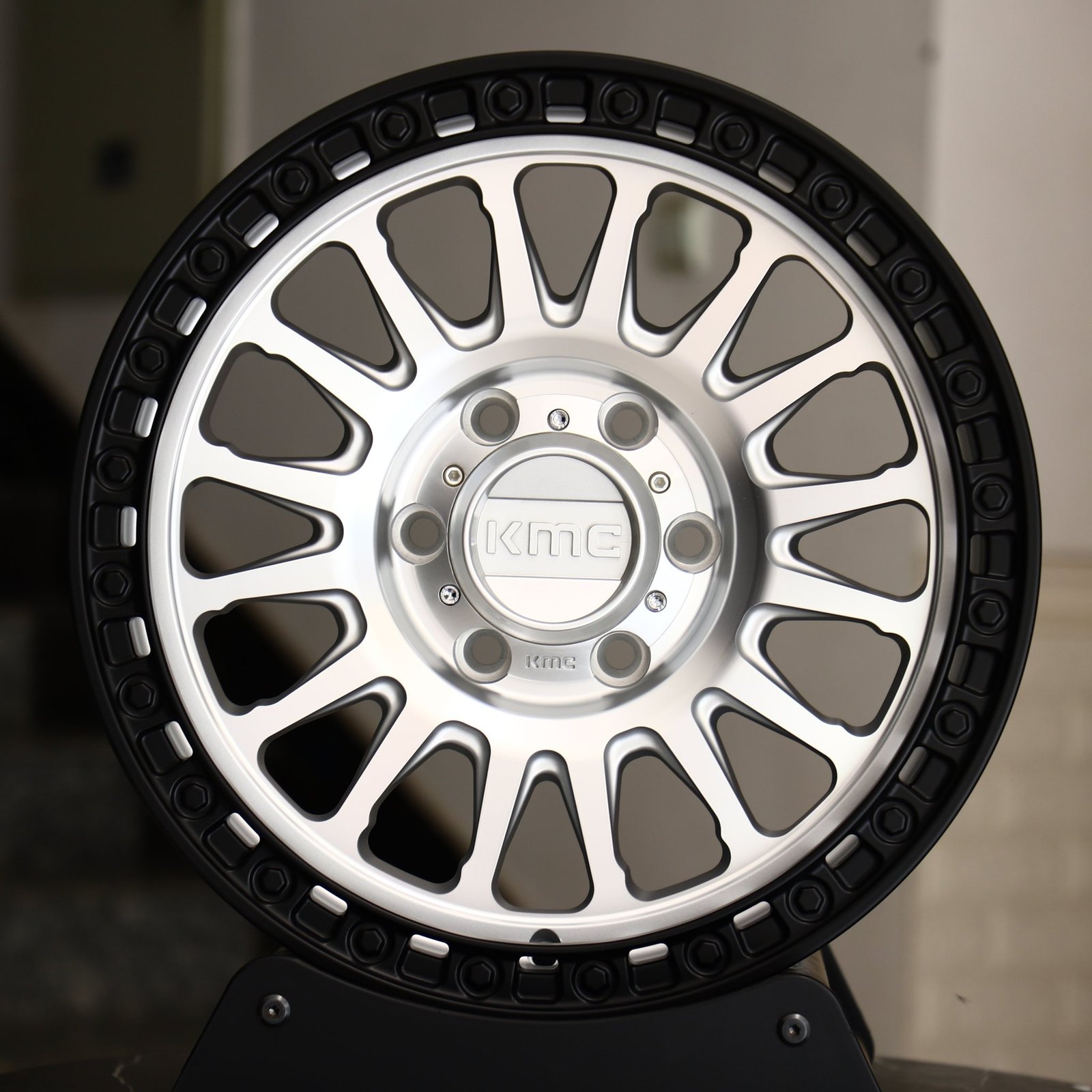 Ford F-150 wheels – KMC Wheels Matte Black 16-Spoke Exposed Bolt Detail, front view