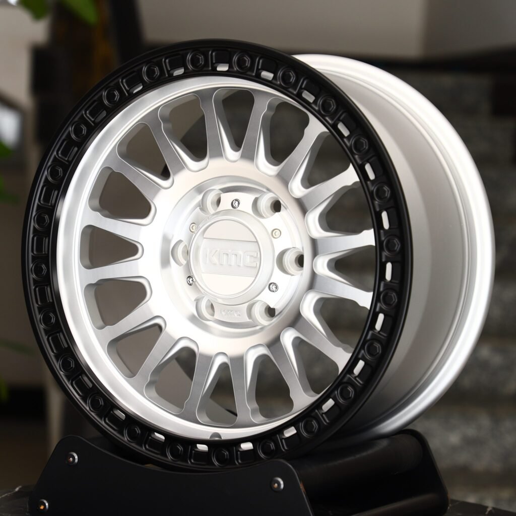 Chevrolet Silverado wheels – KMC Wheels Matte Black 16-Spoke Exposed Bolt Detail, angled view